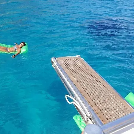 Charter Yacht Full Day Botel Bosa Marina